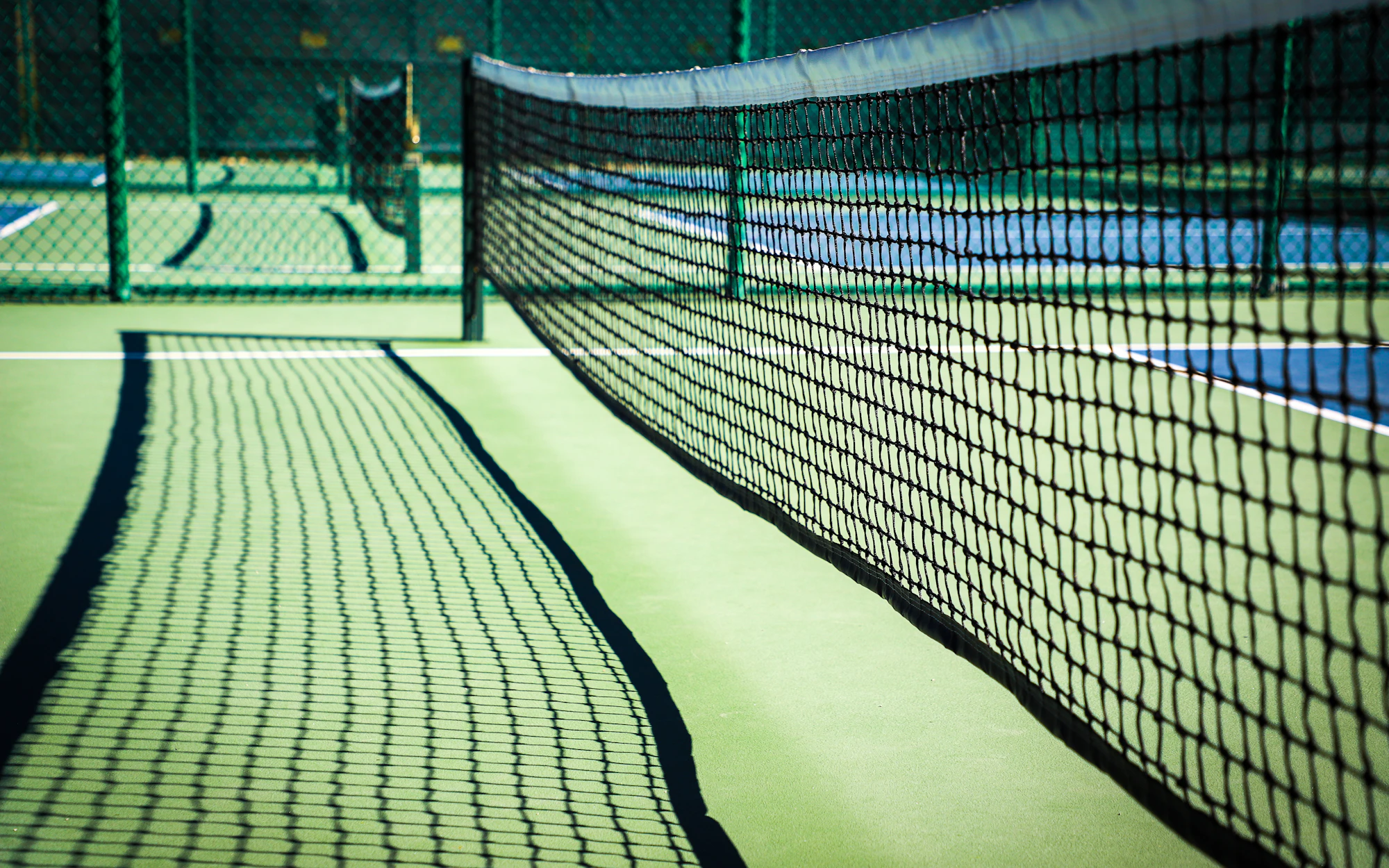 An empty court lit at night